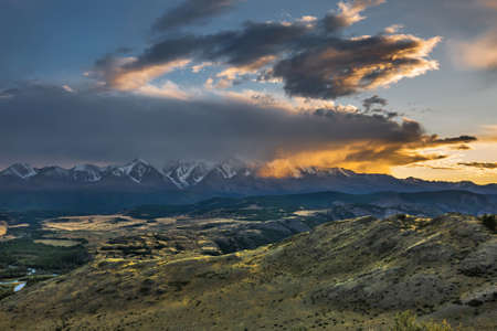 View of the North Chui ridge in the rays of the setting sun. Kosh-Agachsky District of the Altai Republic, Southern Siberia, Russiaの写真素材