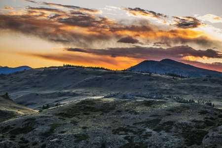 View of the North Chui ridge in the rays of the setting sun. Kosh-Agachsky District of the Altai Republic, Southern Siberia, Russiaの写真素材
