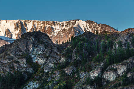 Snow-capped peaks of the mountains of the North Chui range in the morning light. Kosh-Agachsky...