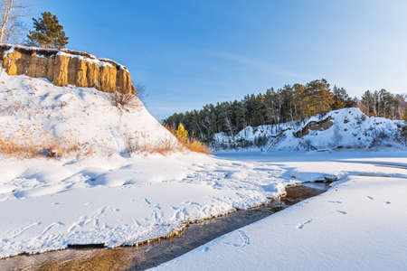 Winter landscape with a river. Razdelnaya River, Berdsk, Novosibirsk Region, Western Siberia of Russiaの写真素材
