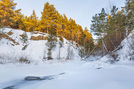 Winter landscape with a river. Razdelnaya River, Berdsk, Novosibirsk Region, Western Siberia of...