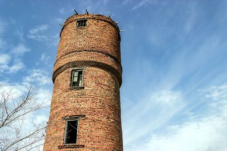 old water tower in the countryside.の写真素材