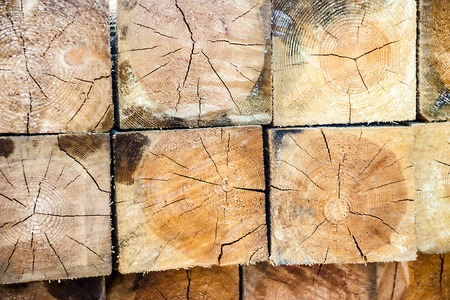 picturedin the photo Background of the square ends of the wooden barsの写真素材