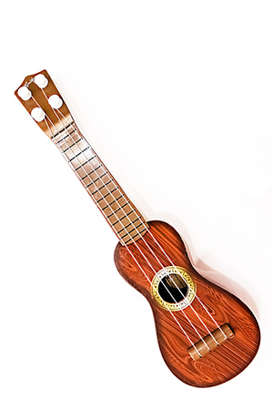 The small toy guitar isolated on a white background.
