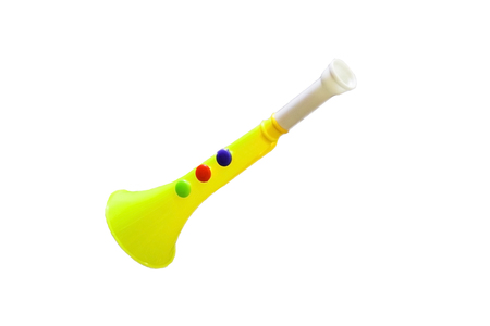 yellow children musical instrument pipe the plastic
