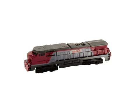 Isolated model of old train locomotive toy.