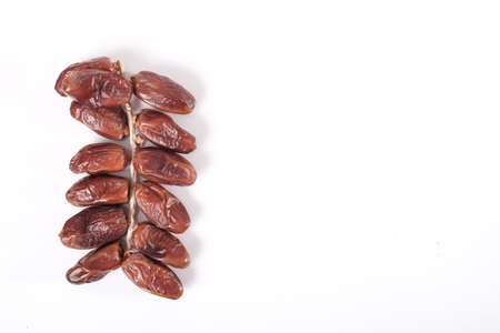 Bunch of premium grade dates with space for text isolated on white background