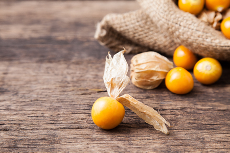 Cape gooseberry on wooden backgroundの写真素材