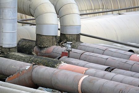 old, huge, industrial pipes in a factory