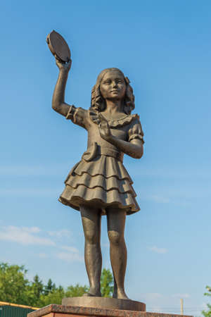 Bronze monument to a girl musician with a tambourineのeditorial素材