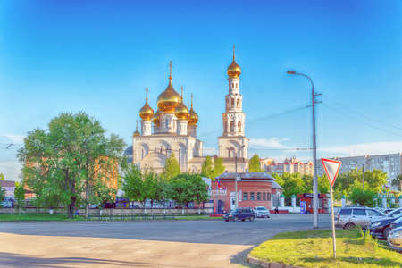 View from the street crossroads to the Golden Domes of the Russian Orthodox Church. Transfiguration...