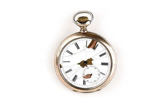 The broken ancient pocket hours with the Roman figures isolated on a light backgroundの写真素材