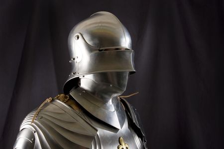 Armour of the medieval knight. Metal protection of the soldier against the weapon of the opponentの写真素材