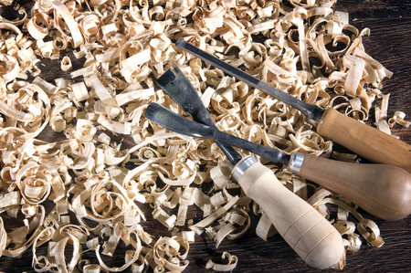 Workplace carpenter. Wood and a few toolsの写真素材