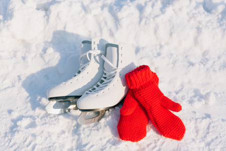 Figure skates in snow close-up. snow backroundの写真素材
