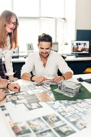 Close up hands of professional architects discussing the projectの写真素材