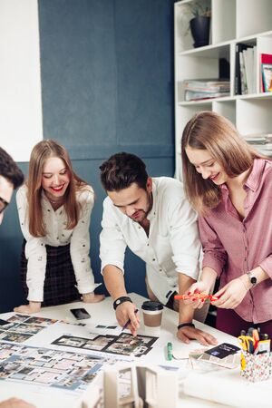 Close up hands of professional architects discussing the projectの写真素材