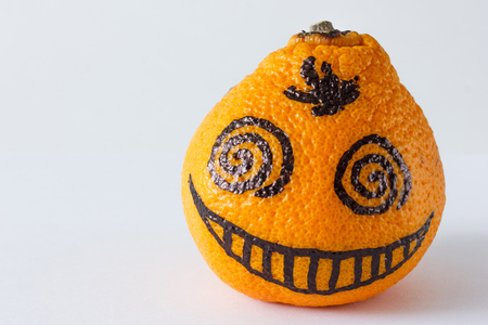 Emotion faces on mandarins photoset. Twisted eyes mandarin.の写真素材