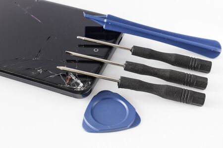 Broken mobile phone repairing.の写真素材