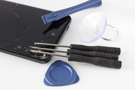 Broken mobile phone repairing.の写真素材