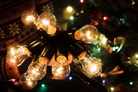 New Year eve photoset. New year garland in woman hands.の写真素材