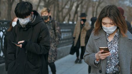Corona Virus Flu Asia. Wearing Respiratory protection Face Masks Korea. Korean City Street Crowd Walk real. Asian Covid-19 Coronavirus Mers. Chinese People. Lockdown 2019-ncov China. Covid19.の写真素材