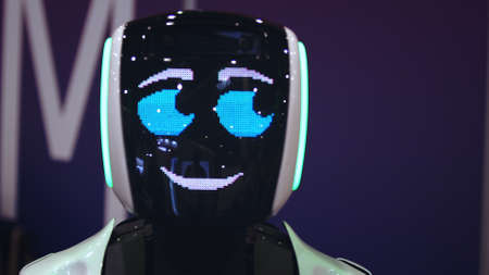 Beautiful portrait robot pulse heart on digital display pixel smile closeup looking at camera 4K....