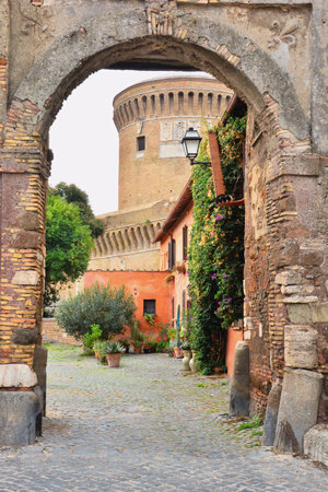 Ostia Antica, Rome, Lazio, Italy-Gate and Castle-Next to the castle of Julius II stands the Renaissance village of Ostia Antica, of medieval origin.の写真素材