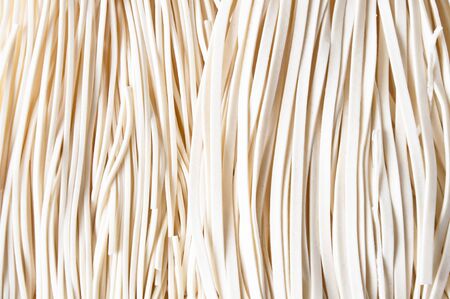 two white noodles Background