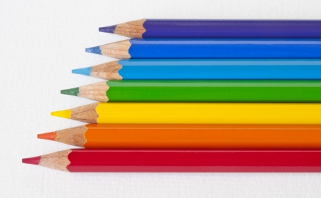 red yellow blue green color pencil Arrangement in white paper backgroundの写真素材