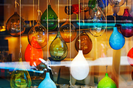 Glass balls marbles abstract colored mix in the shopwindow.の写真素材