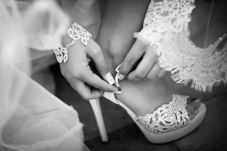 Luxury stylish bridal shoes with jewels. Wedding conceptの写真素材