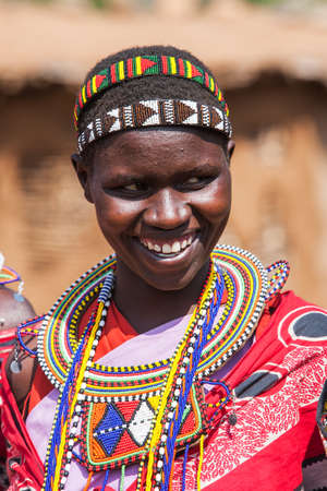 MAASAI MARA, KENYA - AUG 20, 2008: Portrait of unidentified Maasai woman in Maasai Mara, Kenya.のeditorial素材