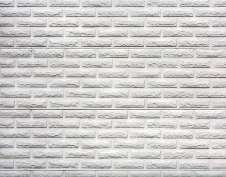The modern white concrete tile wall background.の写真素材