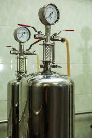Copper still alembic inside distillery to distill grapes and produce spirits