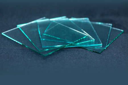 Sheets of Factory manufacturing tempered clear float glass panels cut to sizeの写真素材