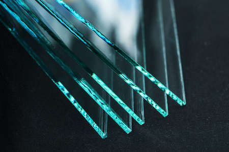 Sheets of Factory manufacturing tempered clear float glass panels cut to size