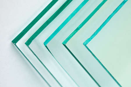 Sheets of Factory manufacturing tempered clear float glass panels cut to sizeの写真素材