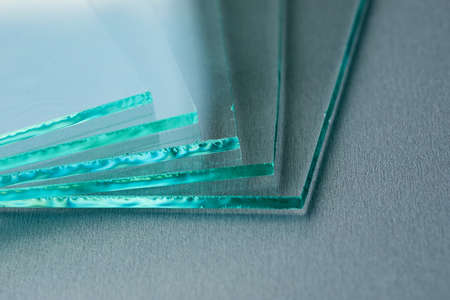 Sheets of Factory manufacturing tempered clear float glass panels cut to size