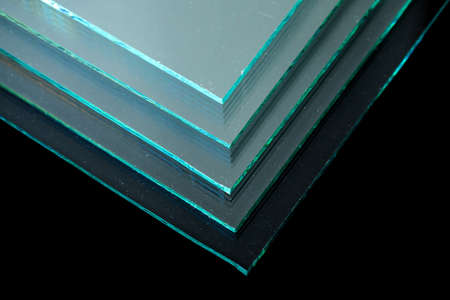 Sheets of Factory manufacturing tempered clear float glass panels cut to sizeの写真素材