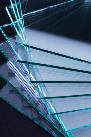Sheets of Factory manufacturing tempered clear float glass panels cut to sizeの写真素材