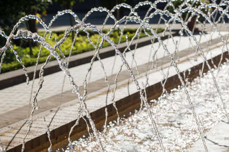 tall fountain spraying from the floor at park