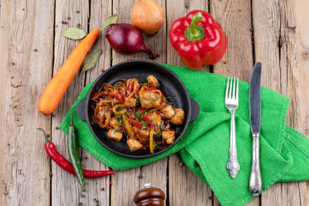 chicken briskaet fried on pan with vegetablesの写真素材