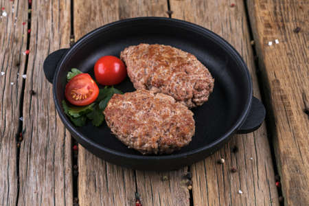 Grilled beef cutlet and vegetables