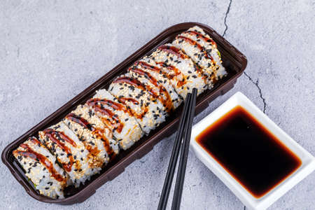Sushi roll sushi with prawn, avocado, cream cheese, sesame. Sushi menu. Japanese food.の写真素材