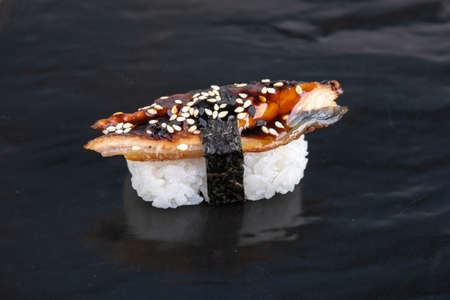 Japanese seafood sushi, on black background