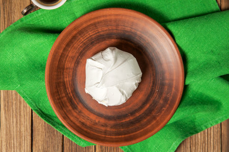 French vanilla meringue cookies on wooden backgroundの写真素材