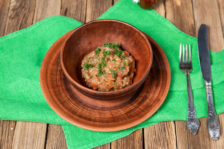 Eggplant caviar in the rustic bowl closeupの写真素材