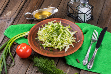 salad of fresh cabbage with onion and dillの写真素材