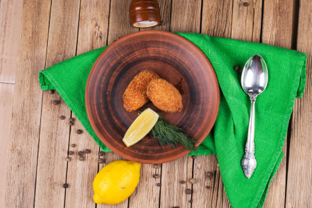 Cod fishcakes served with a rocket, spinach and watercress salad.